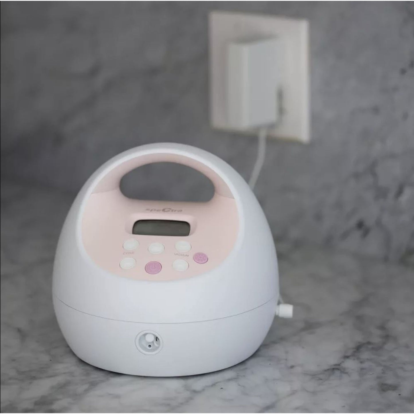 Spectra S2 Plus Electric Breast Pump Kit plugged to an outlet